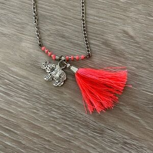 Silver elephant necklace with coral accents